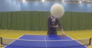 An image of me playing table tennis